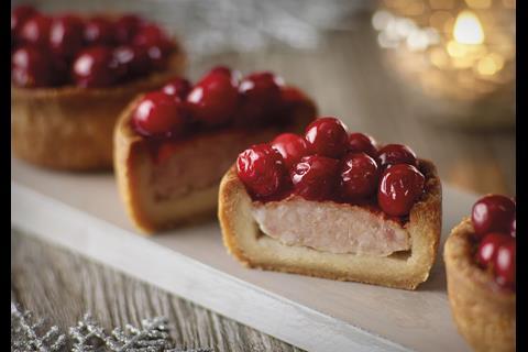 Morrisons' Signature M individual cranberry topped pies are filled with lightly seasoned cured pork. These are also available in a larger family-sized form. 